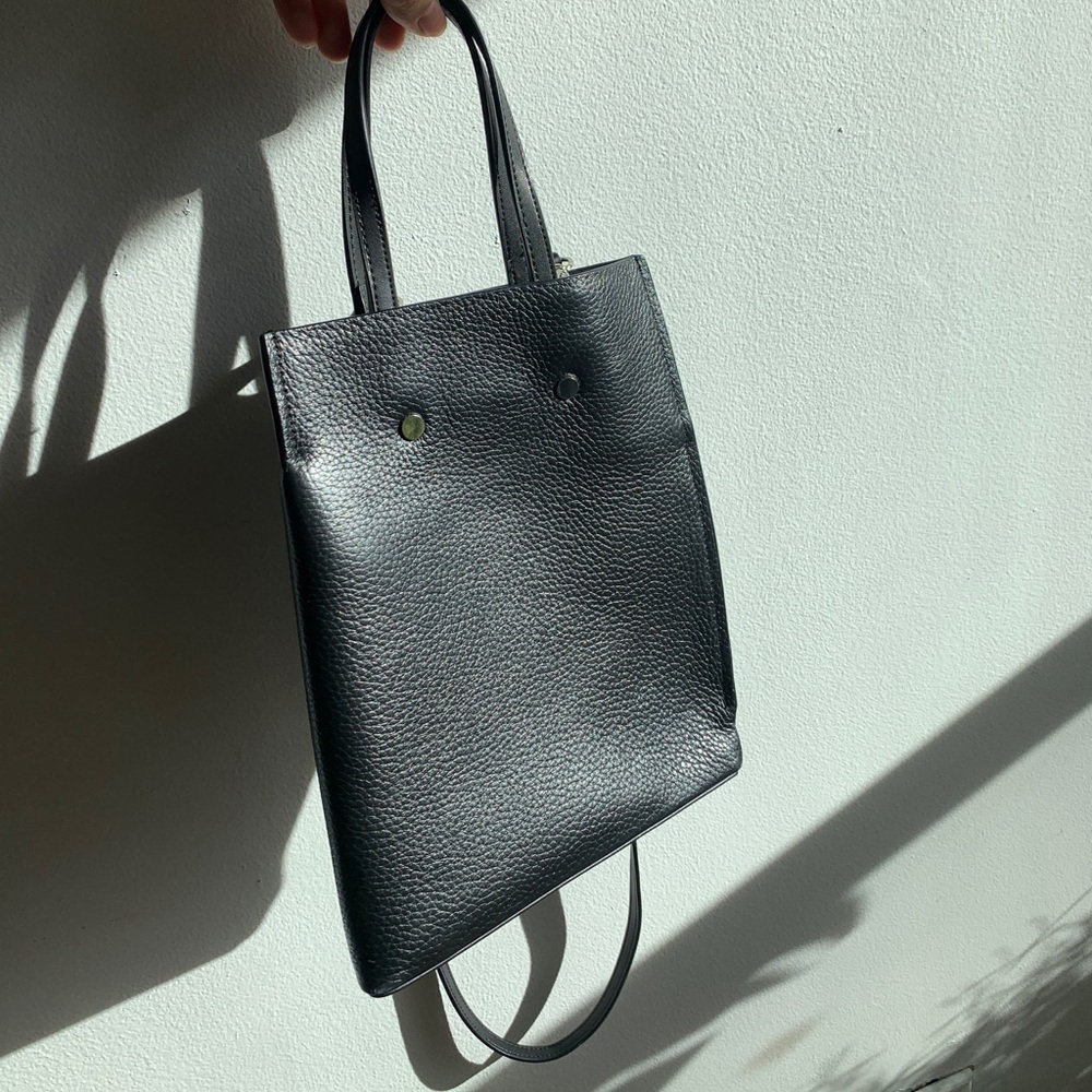 Black leather bucket bag from Opening Ceremony